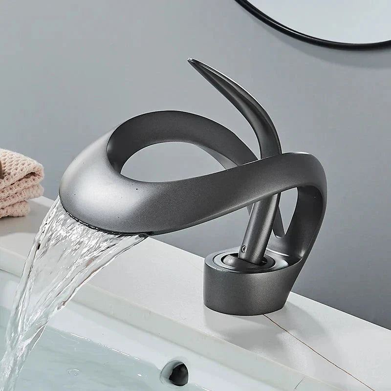 Hertz bathroom mixer tap with waterfall effect.