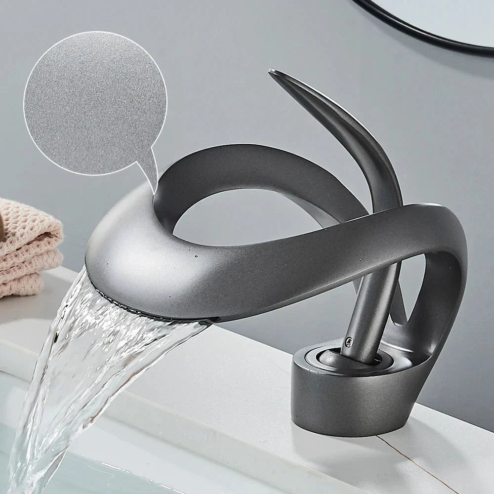 Hertz bathroom mixer tap with waterfall effect.